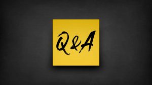 the letters q and a on a post it note