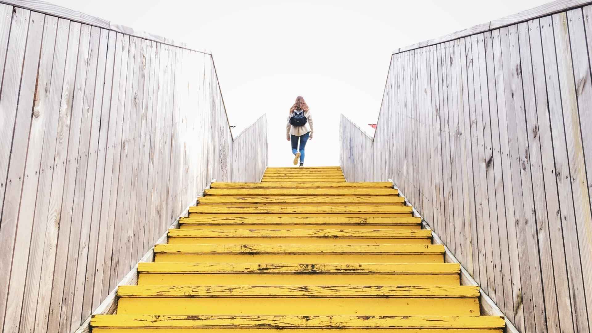 an image of a person climbing stairs
